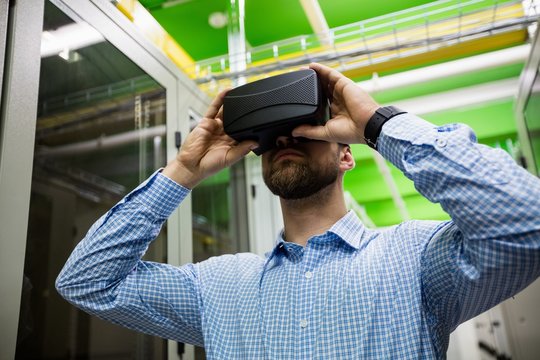 Technician using virtual reality headset
