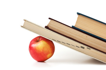 apple under a pile of books