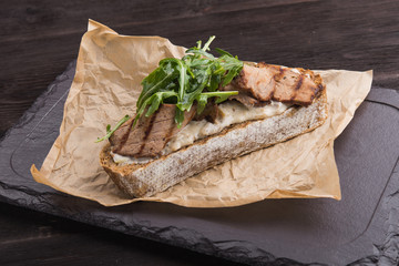sandwich with mushroom sauce and beef
