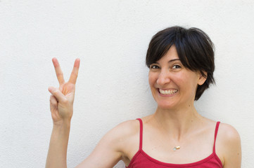 Young Woman Making a Peace Sign