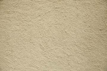 A whole page of rough yellow plaster wall background texture