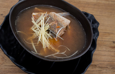 Curry cooked salmon, herbs