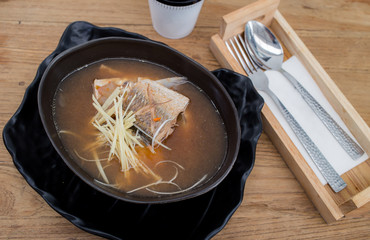 Curry cooked salmon, herbs