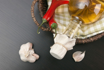 Naklejka premium vegetables and basket with bottle of vinegar