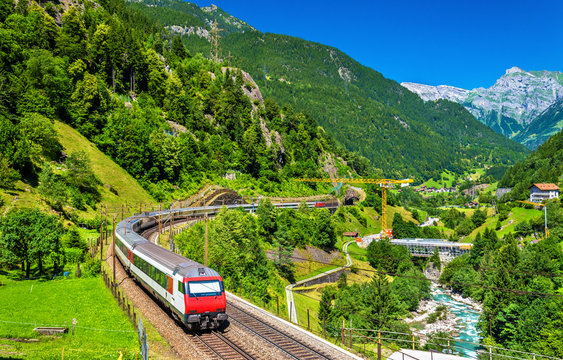 Fototapeta Intercity train at the Gotthard railway - Switzerland