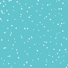 Seamless pattern with falling snowflakes on a blue background