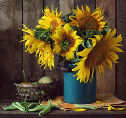 Still-life with a bouquet of sunflowers.