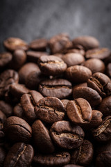 roasted coffee beans on dark background, can be used as a background
