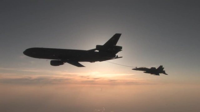 Air Mobility Command KC-10 refuels an F/A-18 Super Hornet.