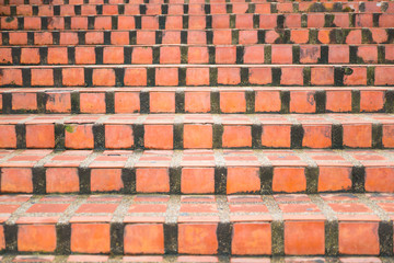 Abstract orange concrete stairs to building for background.