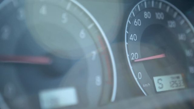 Speedometer And Tachometer In The Car closeup