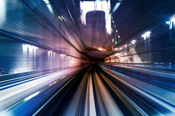 Fototapeta na wymiar Subway tunnel with Motion blur of a city from inside, monorail i