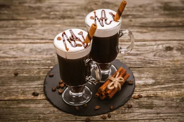 Tuinposter Glass of Irish coffee © George Dolgikh