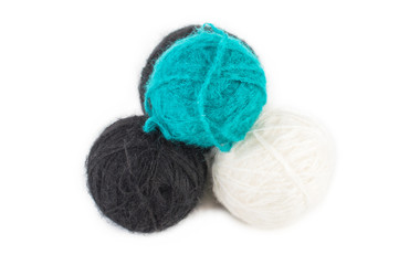 Several multi-colored balls, knitting yarn. On white, isolated background.