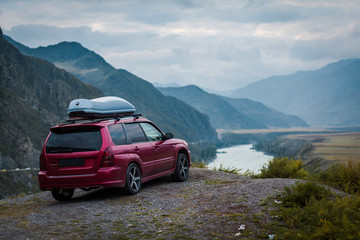 The car on the mountain road, the river.