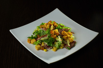Traditional American Caesar salad. Cooking in the USA.