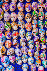 Large group of generic Venetian masks. Vertical shot