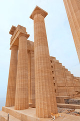 Ancient columns on Lindos island, Greece. Vertical shot