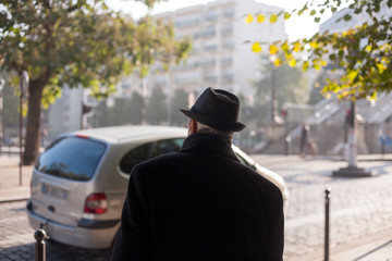 senior walking down the street