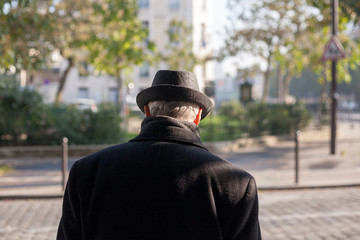 senior walking down the street