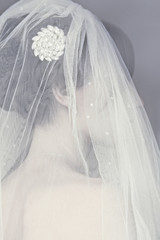 Portrait of a woman wedding bride wearing a decorative veil