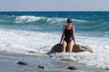 Woman in sea waves