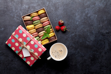 Colorful macaroons and coffee