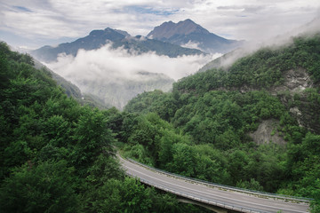 Road to mountain clouds, beautiful nature landscape