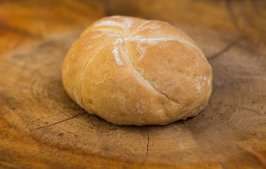  homemade bread rolls on wood background