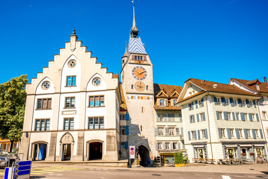 View on the city gate and clock tower in Zug town near Zurich city in Switzerland
