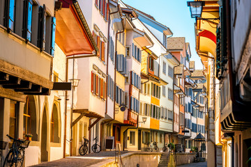 Beautiful colorful buildings in Zug village near Zurich city in Switzerland. Typical historical swiss architecture