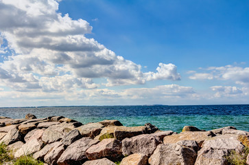 Coastline of the Baltic Sea in summer with foundling stones at Poel island, Germany