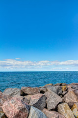 Coastline of the Baltic Sea in summer with foundling stones at Poel island, Germany