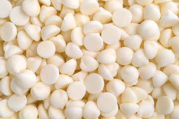 White chocolate baking chips close view.