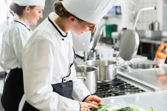Female chefs at work in system catering