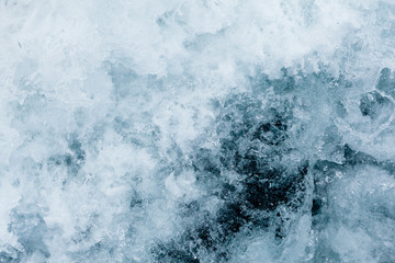 White foam on a sea water surface of the Barents sea