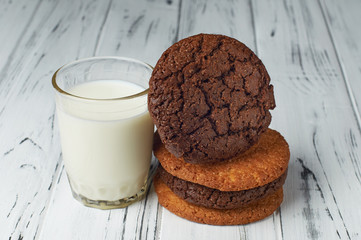 Fresh farm milk and tasty cookies from the oven. The perfect combination. Great breakfast for the child and adult. Delicious and sweet biscuits. A glass of milk before bedtime.
