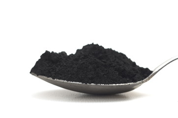 activated charcoal on white background
