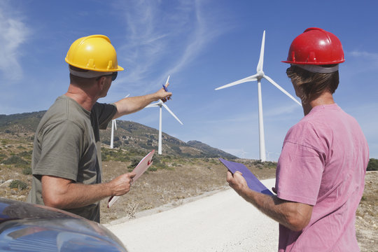 Technicians At A Windfarm Near Tarifa; Cadiz, Andalusia, Spain