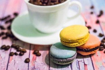 Still life with macaron on wooden background