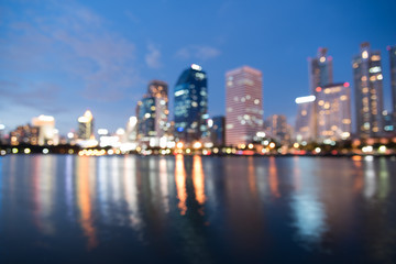Obraz na płótnie Canvas blurred modern city with bokeh for use as background