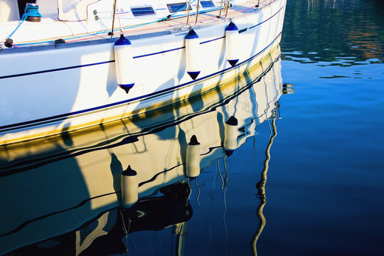 A Yacht Reflected In The Water; Gocek, Mugla Province, Turkey