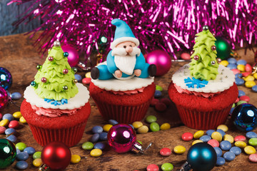 Cupcakes with old wooden background