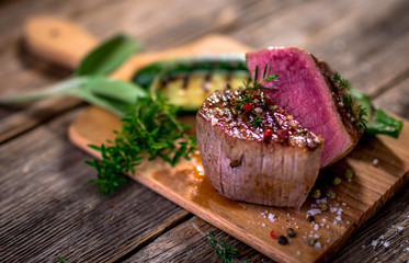 Grilled beef steak  on wooden cutting board