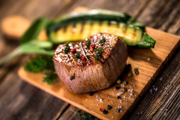 Grilled beef steak  on wooden cutting board