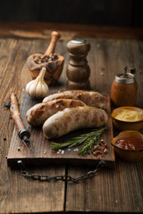 Grilled pork sausages with herbs and spices