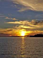 Fototapeta na wymiar Beautiful sea sunset. Natural poster, portrait orientation.