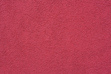 The texture of the red wall