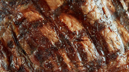 Obraz na płótnie Canvas Macro of grilled meat