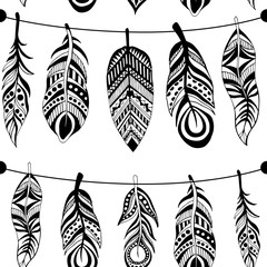 Seamless pattern with hand-drawn feathers flowers and ornaments. The pattern for your design.